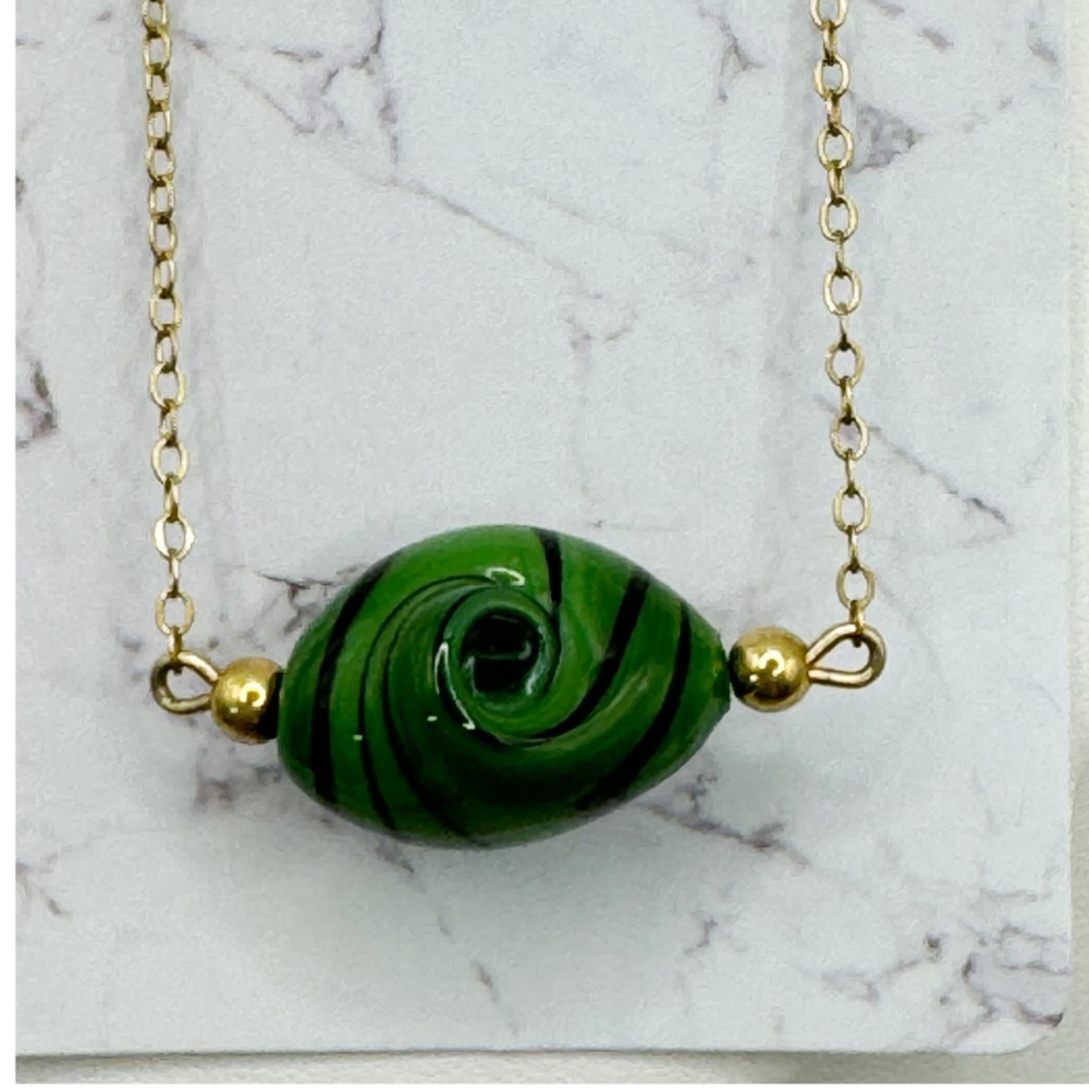 Vintage green and black swirled art glass pendant on gold filled chain 15”